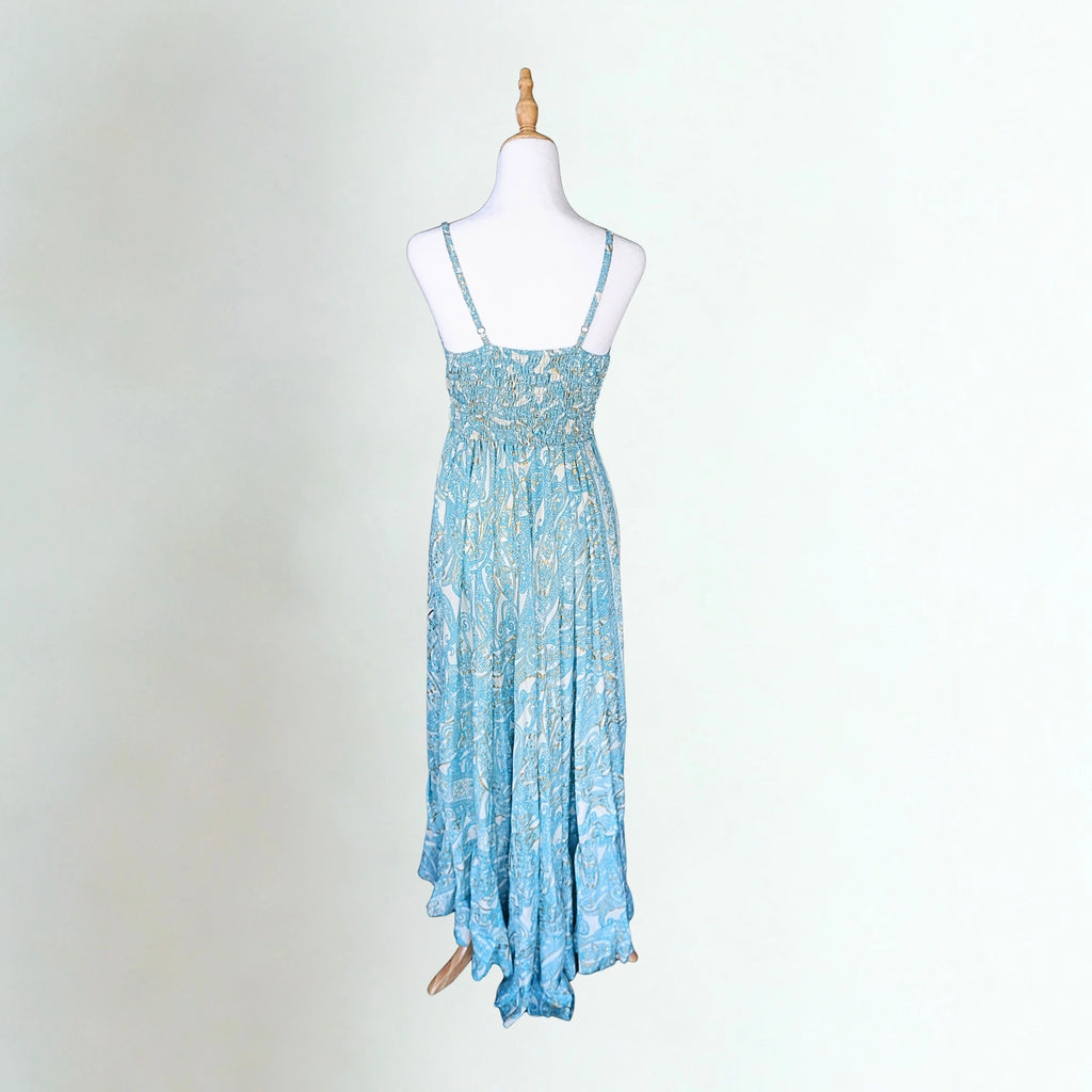 Blue paisley dress with white and gold detail on a mannequin with a white background