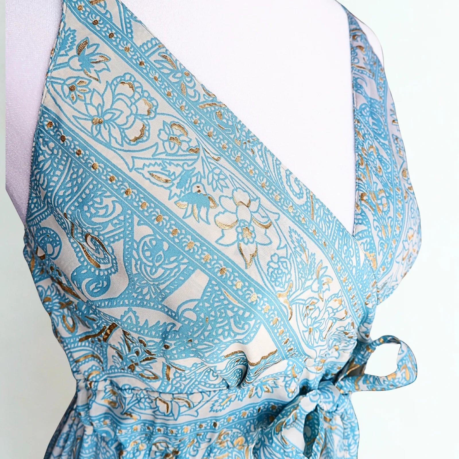 Blue paisley dress detail with tie under bust