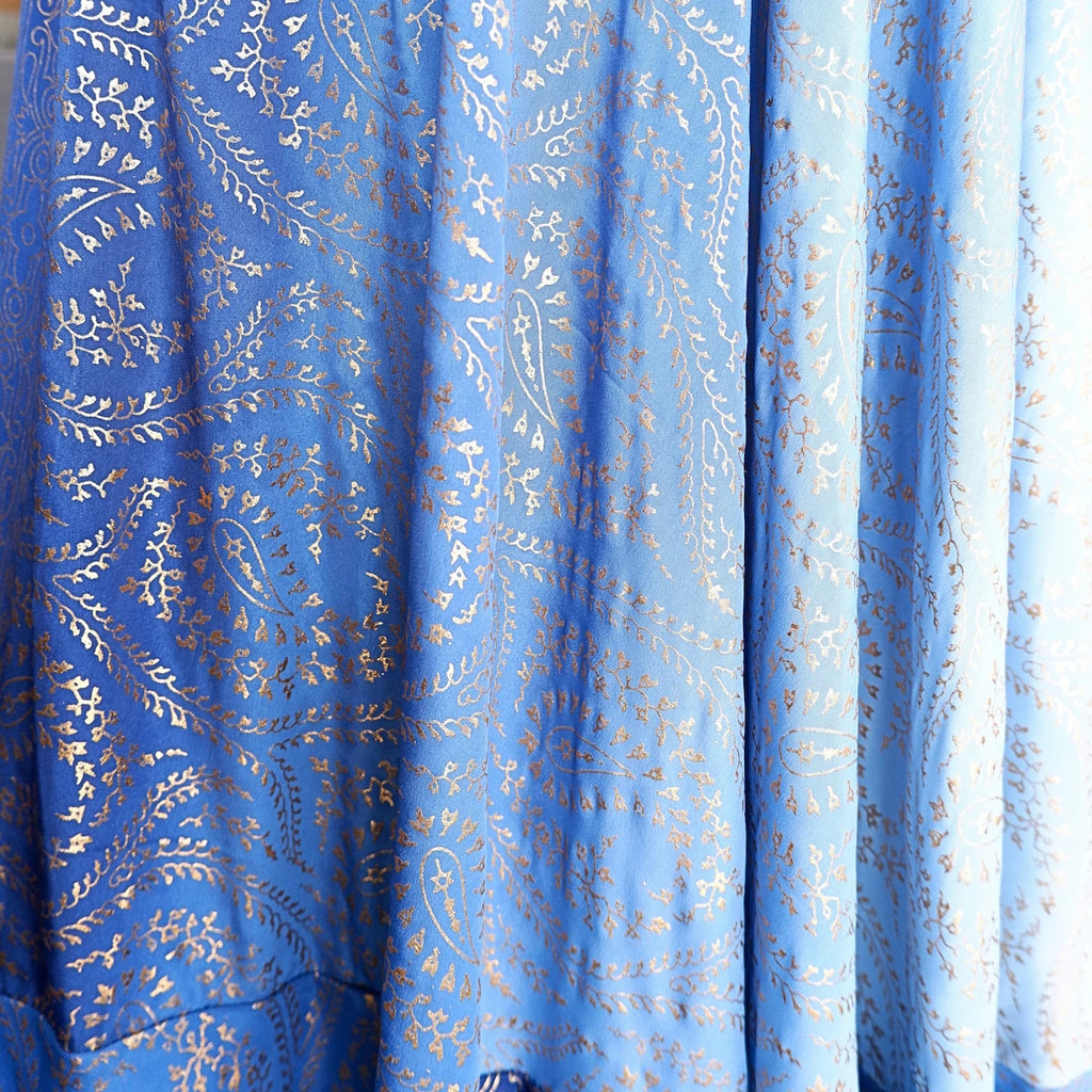 Blue fabric with gold paisley pattern